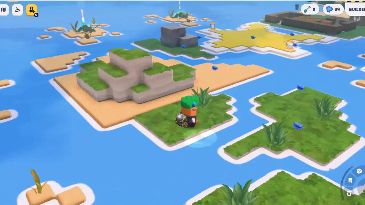 The island later on, grown out across the water with grass, stone and structures.