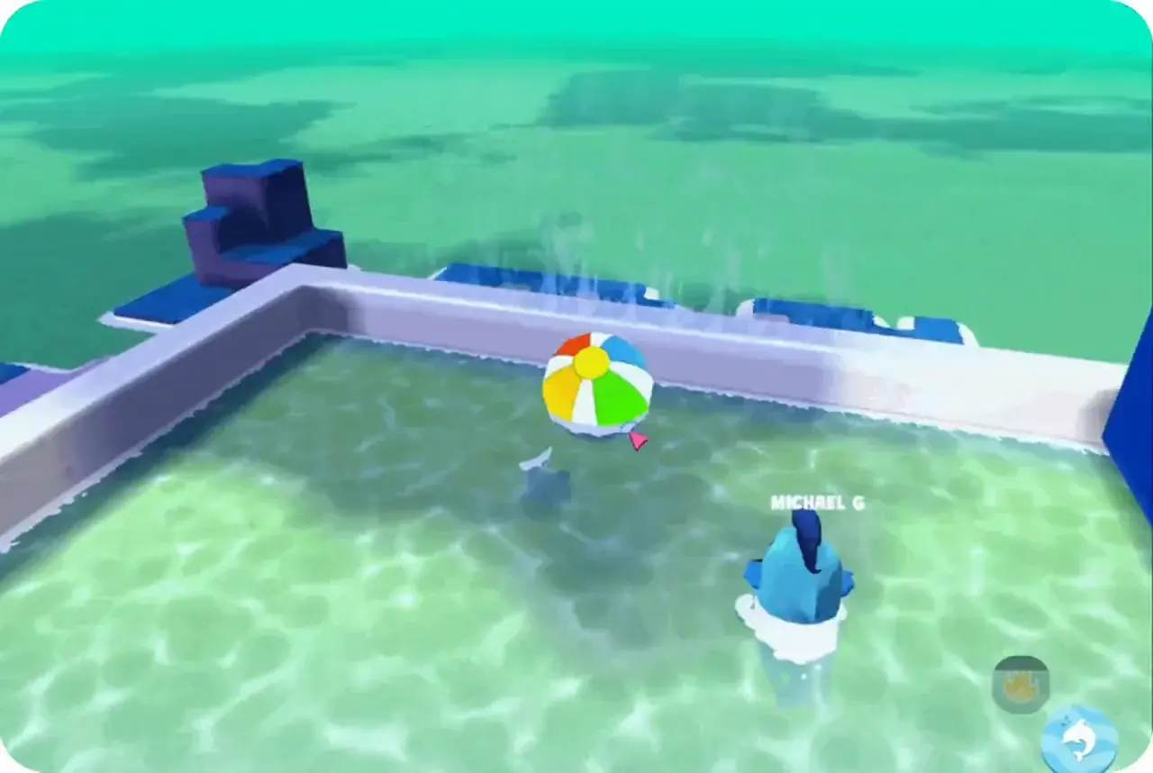A dolphin-costumed player next to the giant beach ball in the pool.
