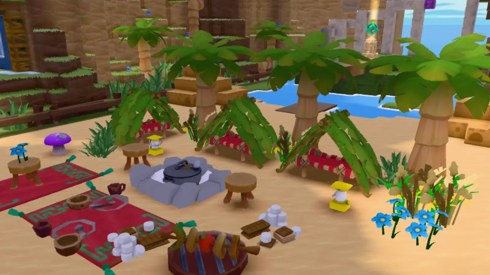 A Dojo Islands camp built from crafted props: a firepit, stools, rugs, lanterns, palm trees and flowers.