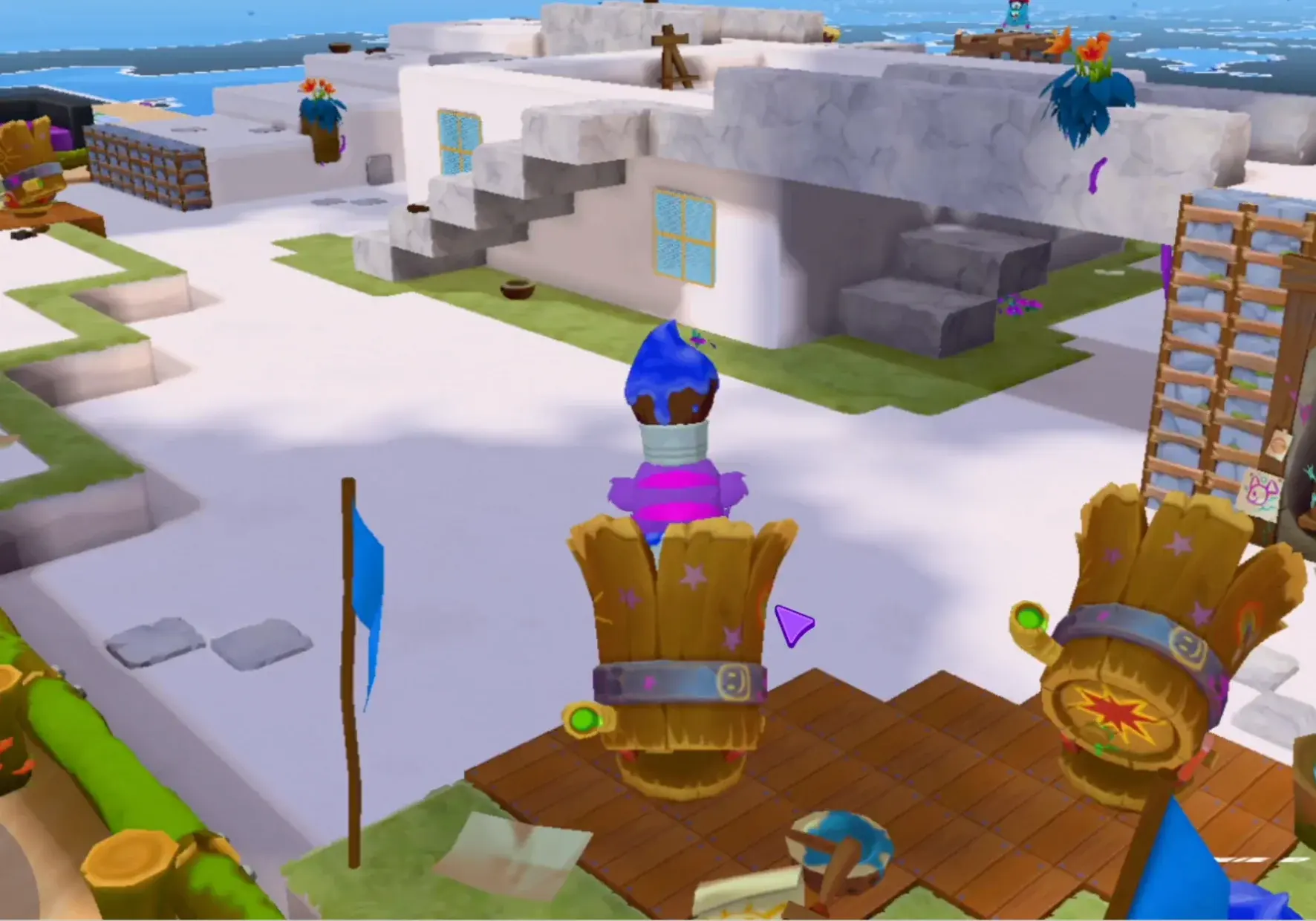 Players mid-air over a paint-splashed level