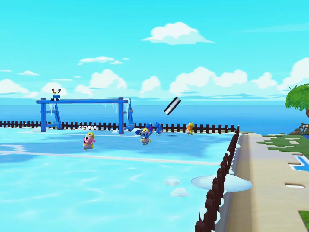 Penguins playing hockey on a frozen rink with blue goals.