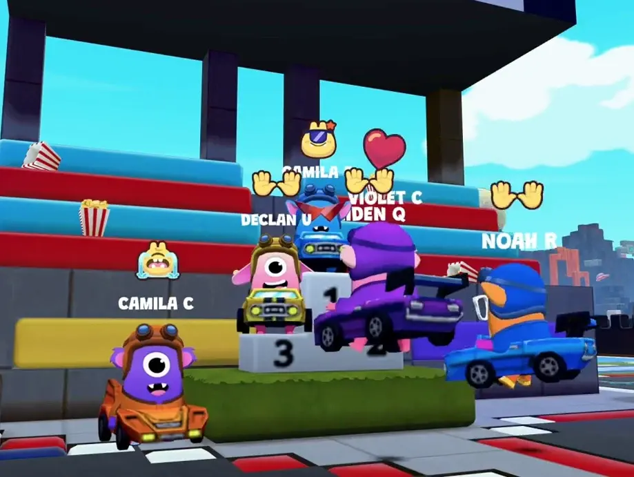 Players celebrating on the 1-2-3 winner's podium at the Racetrack.
