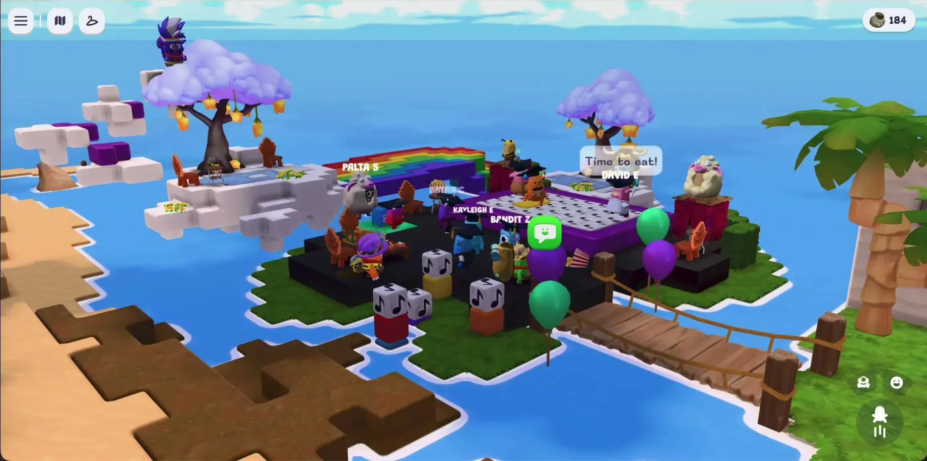 A wide view of the graduation party with characters gathered around the feast, balloons floating up off the platform, and the balloon archway in the background.